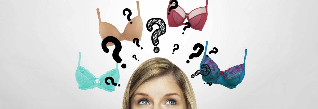 a woman is looking confused with bras floating around her head. Bra myths = busted!